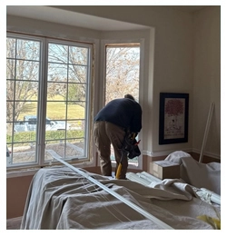 Johnson Restoration Workers on House